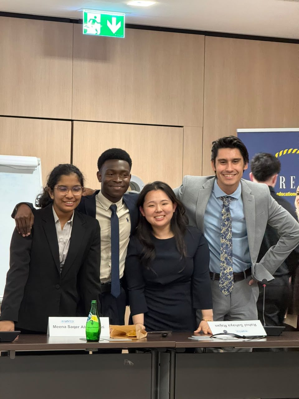 The four-person team after the final presentation at the UNITAR session